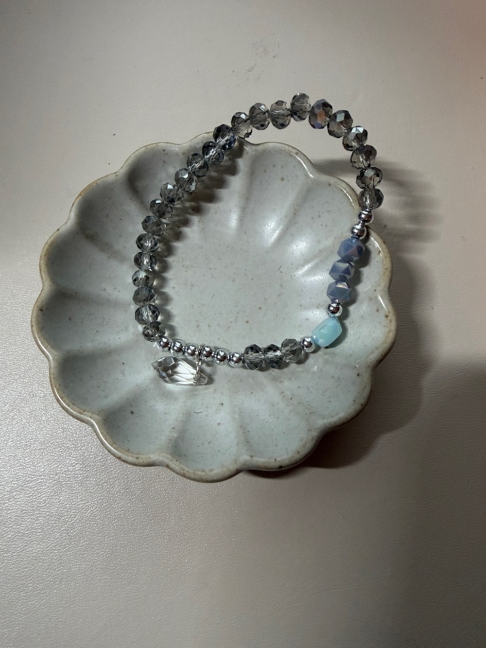 Gray Crystal Stretch Bracelet with Blue Accent Bead